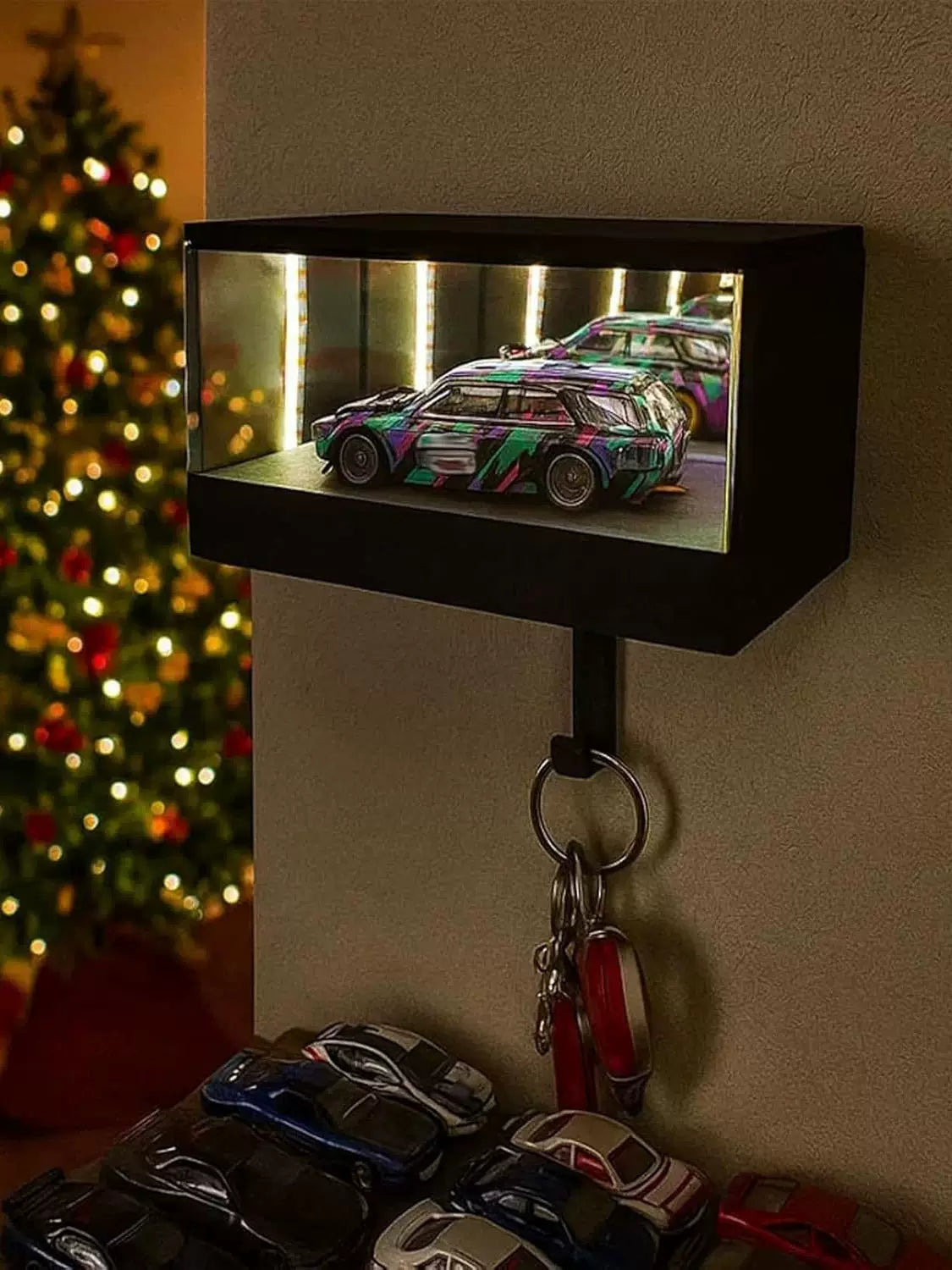 Infinity mirror LED key hook with endless depth effect. Wall-mounted organizer with premium lighting + bonus miniature car. Perfect gift for car lovers and collectors!