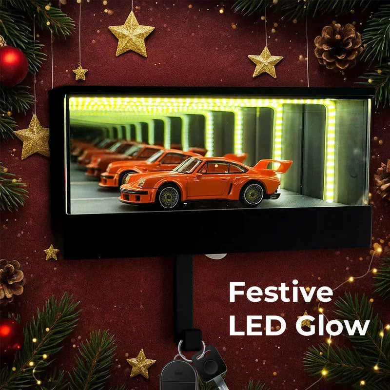 Orange car displayed in a decorative setting with festive LED glow and Christmas decorations.